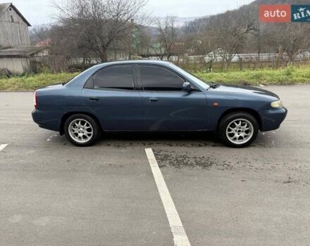 Синий Дэу Нубира, объемом двигателя 1.6 л и пробегом 300 тыс. км за 1294 $, фото 1 на Automoto.ua