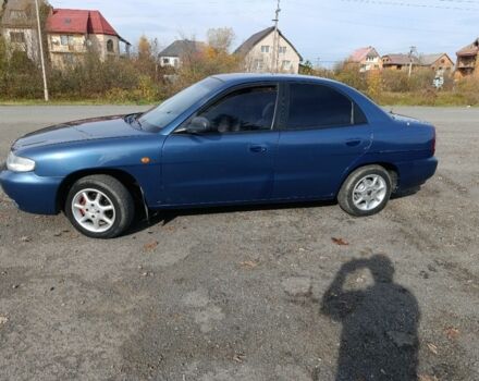 Синій Деу Нубіра, об'ємом двигуна 1 л та пробігом 320 тис. км за 1600 $, фото 6 на Automoto.ua