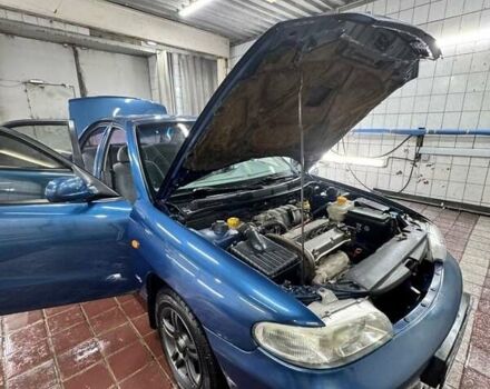 Синий Дэу Нубира, объемом двигателя 1.6 л и пробегом 268 тыс. км за 2400 $, фото 13 на Automoto.ua