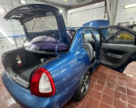 Синій Деу Нубіра, об'ємом двигуна 1.6 л та пробігом 268 тис. км за 2400 $, фото 7 на Automoto.ua