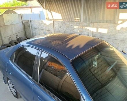 Синій Деу Нубіра, об'ємом двигуна 1.6 л та пробігом 182 тис. км за 2400 $, фото 2 на Automoto.ua