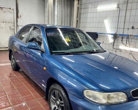 Синій Деу Нубіра, об'ємом двигуна 1.6 л та пробігом 268 тис. км за 2400 $, фото 16 на Automoto.ua