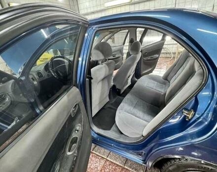 Синий Дэу Нубира, объемом двигателя 1.6 л и пробегом 268 тыс. км за 2400 $, фото 3 на Automoto.ua