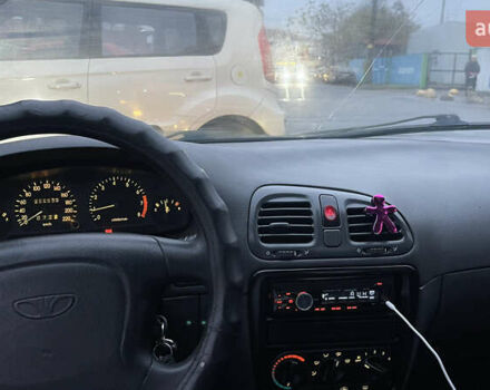 Синій Деу Нубіра, об'ємом двигуна 1.6 л та пробігом 256 тис. км за 1750 $, фото 6 на Automoto.ua