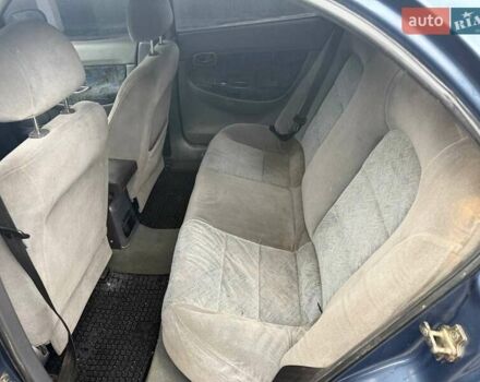 Синий Дэу Нубира, объемом двигателя 1.6 л и пробегом 300 тыс. км за 1294 $, фото 8 на Automoto.ua