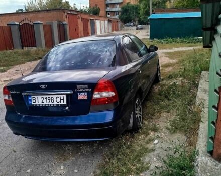 Синій Деу Нубіра, об'ємом двигуна 2 л та пробігом 200 тис. км за 1390 $, фото 3 на Automoto.ua