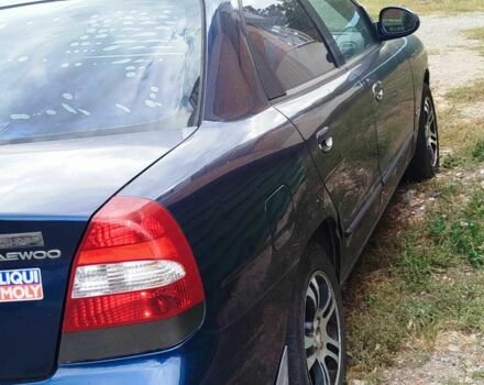 Синій Деу Нубіра, об'ємом двигуна 2 л та пробігом 200 тис. км за 1390 $, фото 2 на Automoto.ua