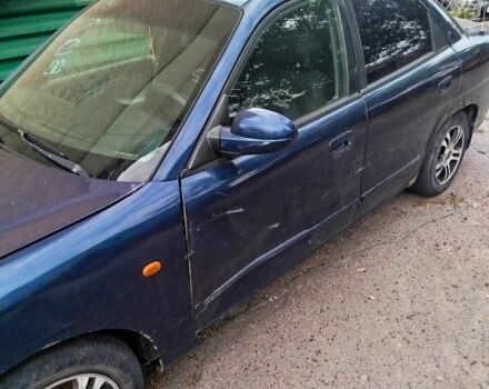 Синій Деу Нубіра, об'ємом двигуна 2 л та пробігом 200 тис. км за 1390 $, фото 5 на Automoto.ua