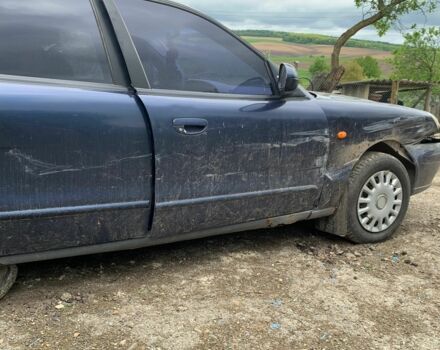 Синій Деу Нубіра, об'ємом двигуна 2 л та пробігом 260 тис. км за 799 $, фото 3 на Automoto.ua