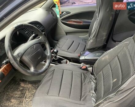 Синій Деу Нубіра, об'ємом двигуна 2 л та пробігом 260 тис. км за 500 $, фото 8 на Automoto.ua