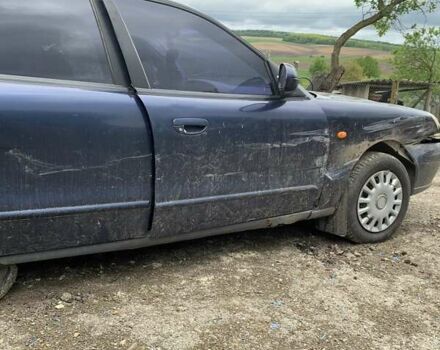 Синій Деу Нубіра, об'ємом двигуна 2 л та пробігом 260 тис. км за 500 $, фото 5 на Automoto.ua