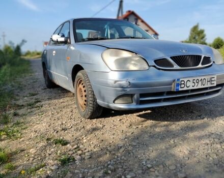 Синий Дэу Нубира, объемом двигателя 2 л и пробегом 321 тыс. км за 1500 $, фото 4 на Automoto.ua
