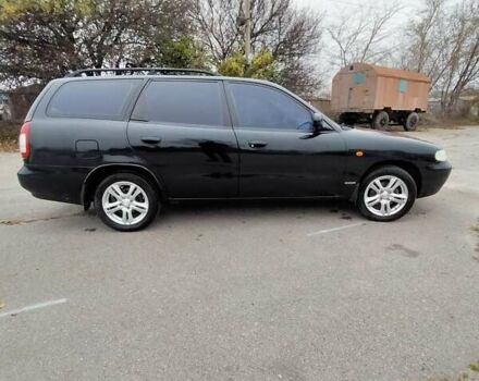 Синий Дэу Нубира, объемом двигателя 2 л и пробегом 292 тыс. км за 3500 $, фото 11 на Automoto.ua