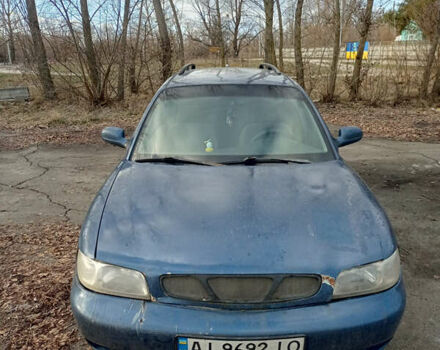 Синій Деу Нубіра, об'ємом двигуна 2 л та пробігом 380 тис. км за 1300 $, фото 12 на Automoto.ua