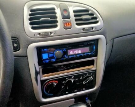 Синий Дэу Нубира, объемом двигателя 2 л и пробегом 292 тыс. км за 3500 $, фото 3 на Automoto.ua