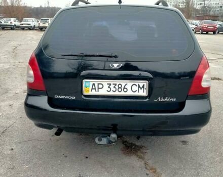 Синий Дэу Нубира, объемом двигателя 2 л и пробегом 292 тыс. км за 3500 $, фото 9 на Automoto.ua