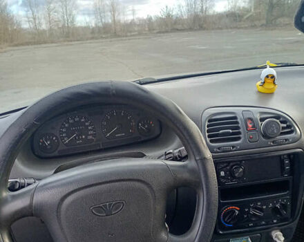 Синій Деу Нубіра, об'ємом двигуна 2 л та пробігом 380 тис. км за 1300 $, фото 2 на Automoto.ua