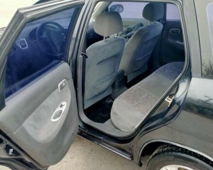 Синий Дэу Нубира, объемом двигателя 2 л и пробегом 292 тыс. км за 3500 $, фото 6 на Automoto.ua