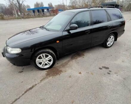 Синий Дэу Нубира, объемом двигателя 2 л и пробегом 292 тыс. км за 3500 $, фото 14 на Automoto.ua