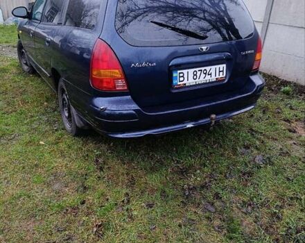 Синий Дэу Нубира, объемом двигателя 2 л и пробегом 312 тыс. км за 2200 $, фото 4 на Automoto.ua