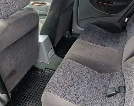 Синий Дэу Нубира, объемом двигателя 2 л и пробегом 312 тыс. км за 2200 $, фото 6 на Automoto.ua