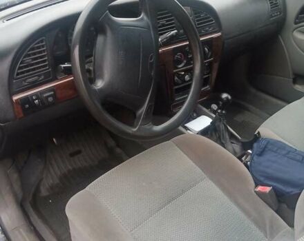 Синий Дэу Нубира, объемом двигателя 2 л и пробегом 260 тыс. км за 2300 $, фото 3 на Automoto.ua