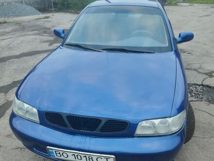 Синій Деу Нубіра, об'ємом двигуна 2 л та пробігом 250 тис. км за 1250 $, фото 1 на Automoto.ua