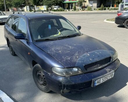 Синій Деу Нубіра, об'ємом двигуна 0 л та пробігом 300 тис. км за 571 $, фото 1 на Automoto.ua