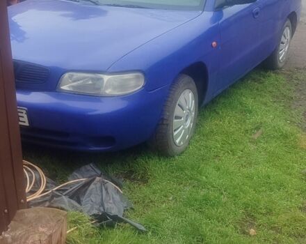 Синій Деу Нубіра, об'ємом двигуна 1.6 л та пробігом 203 тис. км за 950 $, фото 1 на Automoto.ua