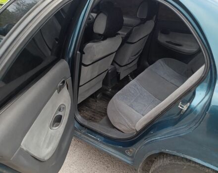 Зеленый Дэу Нубира, объемом двигателя 2 л и пробегом 435 тыс. км за 1700 $, фото 4 на Automoto.ua