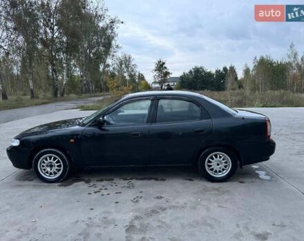 Зеленый Дэу Нубира, объемом двигателя 1.6 л и пробегом 250 тыс. км за 1250 $, фото 9 на Automoto.ua