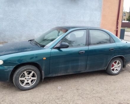 Зеленый Дэу Нубира, объемом двигателя 1.6 л и пробегом 363 тыс. км за 500 $, фото 6 на Automoto.ua