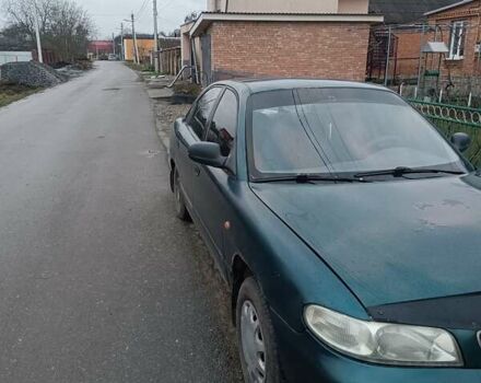 Зеленый Дэу Нубира, объемом двигателя 1.6 л и пробегом 282 тыс. км за 950 $, фото 3 на Automoto.ua