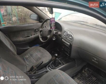 Зеленый Дэу Нубира, объемом двигателя 1.6 л и пробегом 256 тыс. км за 750 $, фото 14 на Automoto.ua