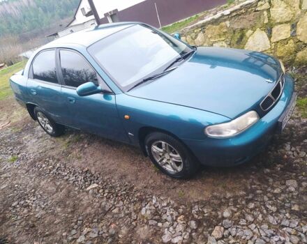 Зеленый Дэу Нубира, объемом двигателя 1.6 л и пробегом 340 тыс. км за 1500 $, фото 2 на Automoto.ua