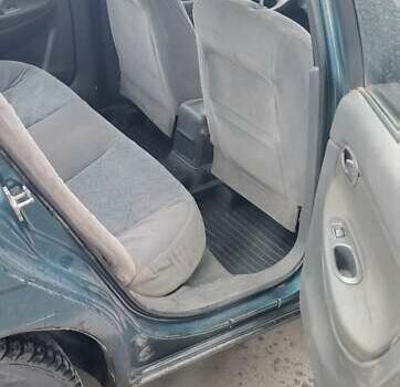 Зеленый Дэу Нубира, объемом двигателя 1.6 л и пробегом 270 тыс. км за 1663 $, фото 9 на Automoto.ua