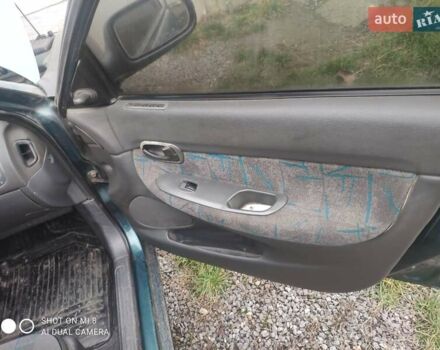 Зеленый Дэу Нубира, объемом двигателя 1.6 л и пробегом 256 тыс. км за 750 $, фото 10 на Automoto.ua