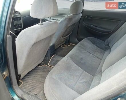 Деу Нубіра 1998 у Тернополі на Automoto.ua Зелений Деу Нубіра, об'ємом двигуна 1.6 л та пробігом 358 тис. км за 1500 $, фото 8 на Automoto.ua