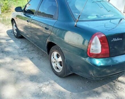 Зеленый Дэу Нубира, объемом двигателя 1.6 л и пробегом 260 тыс. км за 1300 $, фото 4 на Automoto.ua