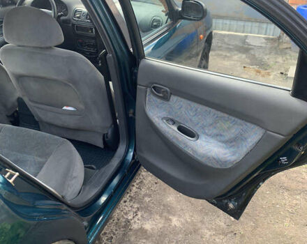 Зеленый Дэу Нубира, объемом двигателя 1.6 л и пробегом 255 тыс. км за 1800 $, фото 9 на Automoto.ua