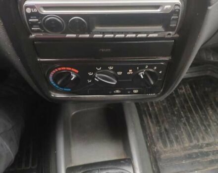 Зеленый Дэу Нубира, объемом двигателя 1.6 л и пробегом 256 тыс. км за 750 $, фото 7 на Automoto.ua