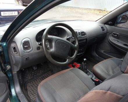 Зелений Деу Нубіра, об'ємом двигуна 2 л та пробігом 240 тис. км за 1313 $, фото 6 на Automoto.ua