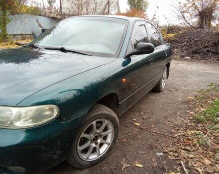 Зелений Деу Нубіра, об'ємом двигуна 2 л та пробігом 240 тис. км за 1313 $, фото 2 на Automoto.ua