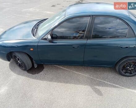 Деу Нубіра 1998 у Тернополі на Automoto.ua Зелений Деу Нубіра, об'ємом двигуна 1.6 л та пробігом 358 тис. км за 1500 $, фото 4 на Automoto.ua