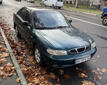 Зеленый Дэу Нубира, объемом двигателя 1.6 л и пробегом 214 тыс. км за 1600 $, фото 1 на Automoto.ua