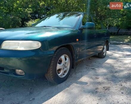 Зеленый Дэу Нубира, объемом двигателя 1.6 л и пробегом 260 тыс. км за 1300 $, фото 1 на Automoto.ua