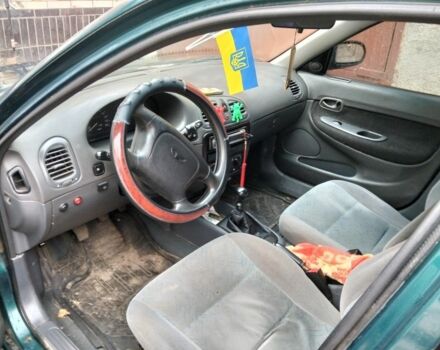 Зеленый Дэу Нубира, объемом двигателя 1.6 л и пробегом 300 тыс. км за 1662 $, фото 4 на Automoto.ua