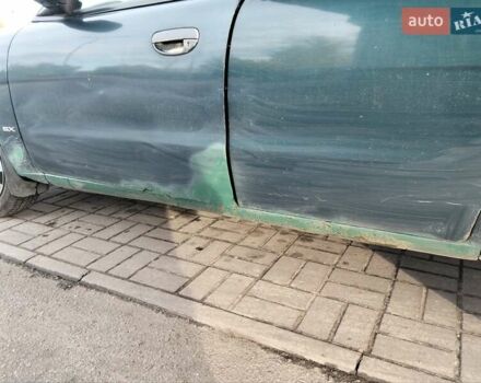 Деу Нубіра 1998 у Кременчуге на Automoto.ua Зелений Деу Нубіра, об'ємом двигуна 1.6 л та пробігом 345 тис. км за 1200 $, фото 10 на Automoto.ua