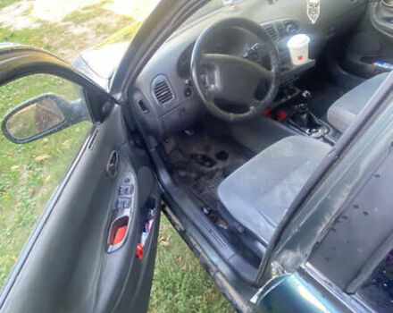 Зеленый Дэу Нубира, объемом двигателя 1.6 л и пробегом 350 тыс. км за 1300 $, фото 4 на Automoto.ua