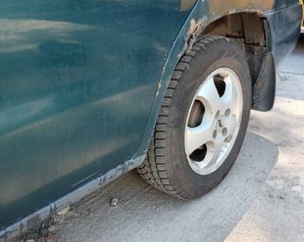 Зеленый Дэу Нубира, объемом двигателя 1.6 л и пробегом 260 тыс. км за 1300 $, фото 3 на Automoto.ua